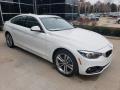 Front 3/4 View of 2019 BMW 4 Series 430i xDrive Gran Coupe #1