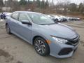 Front 3/4 View of 2019 Honda Civic LX Hatchback #6