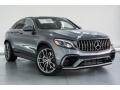 Front 3/4 View of 2019 Mercedes-Benz GLC AMG 63 4Matic Coupe #12