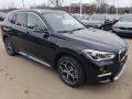 Front 3/4 View of 2019 BMW X1 xDrive28i #1