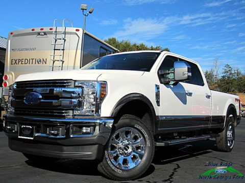 White Platinum Ford F350 Super Duty Lariat Crew Cab 4x4.  Click to enlarge.