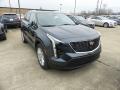 Front 3/4 View of 2019 Cadillac XT4 Luxury AWD #1