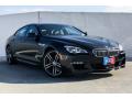 Front 3/4 View of 2019 BMW 6 Series 650i Gran Coupe #12