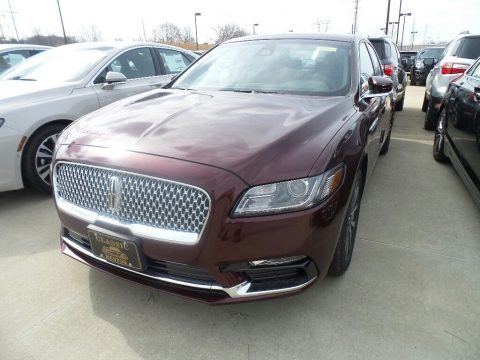 Burgundy Velvet Metallic Lincoln Continental FWD.  Click to enlarge.