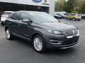 Front 3/4 View of 2019 Lincoln MKC FWD #7