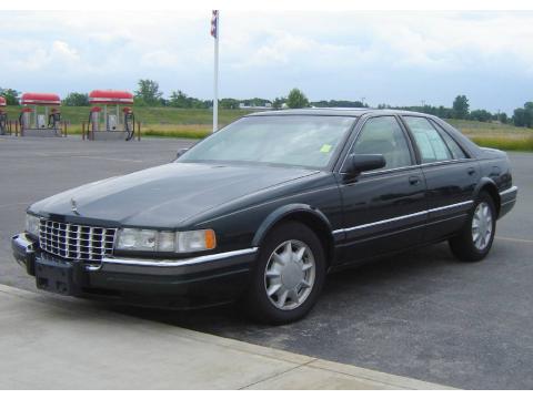 Dark Polo Green Metallic 1996 Cadillac Seville SLS with Saddle Beige 
