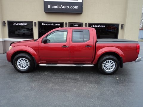 Lava Red Nissan Frontier SV Crew Cab 4x4.  Click to enlarge.