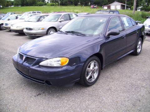 Navy Blue Metallic Pontiac Grand Am SE Sedan.  Click to enlarge.