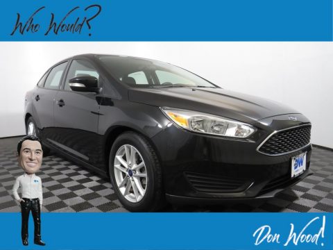 Tuxedo Black Metallic Ford Focus SE Sedan.  Click to enlarge.