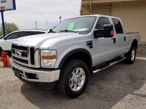 Silver Metallic Ford F350 Super Duty Lariat Crew Cab 4x4.  Click to enlarge.