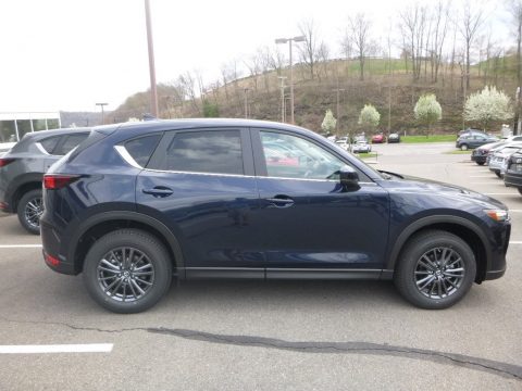Deep Crystal Blue Mica Mazda CX-5 Touring AWD.  Click to enlarge.