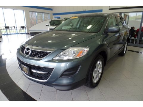 Dolphin Gray Mica Mazda CX-9 Touring AWD. Click to enlarge. Dolphin Gray Mica Mazda CX-9 Touring AWD. Click to enlarge.