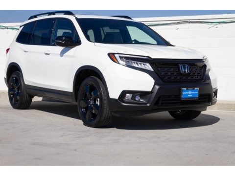 White Diamond Pearl Honda Passport Elite AWD.  Click to enlarge.