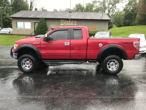 Red Candy Metallic Ford F150 XLT SuperCab 4x4.  Click to enlarge.