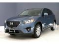 Front 3/4 View of 2016 Mazda CX-5 Touring #12