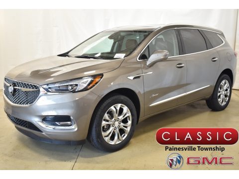 Champagne Gold Metallic Buick Enclave Avenir AWD.  Click to enlarge.