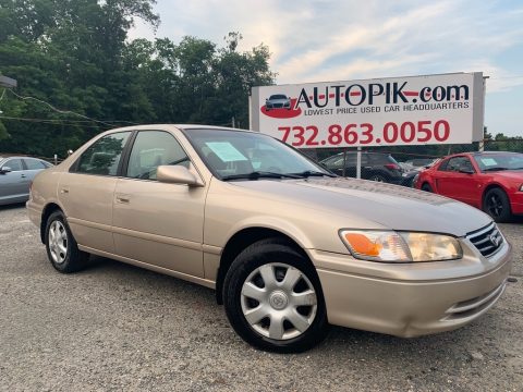Cashmere Beige Metallic Toyota Camry LE.  Click to enlarge.