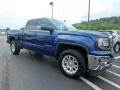 Front 3/4 View of 2019 GMC Sierra 1500 Limited SLE Double Cab 4WD #4