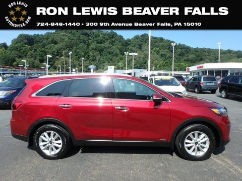 Passion Red Kia Sorento LX AWD.  Click to enlarge. Passion Red Kia Sorento LX AWD.  Click to enlarge.