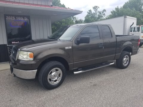 Pueblo Gold Metallic Ford F150 XLT SuperCab 4x4.  Click to enlarge.
