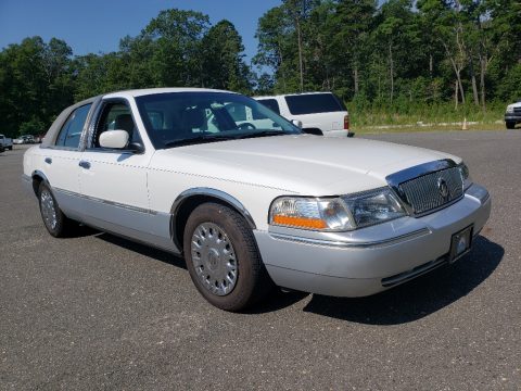 Vibrant White Mercury Grand Marquis GS.  Click to enlarge.