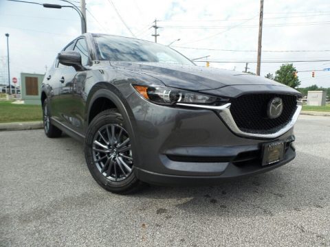 Machine Gray Metallic Mazda CX-5 Touring AWD. Click to enlarge. Machine Gray Metallic Mazda CX-5 Touring AWD. Click to enlarge.