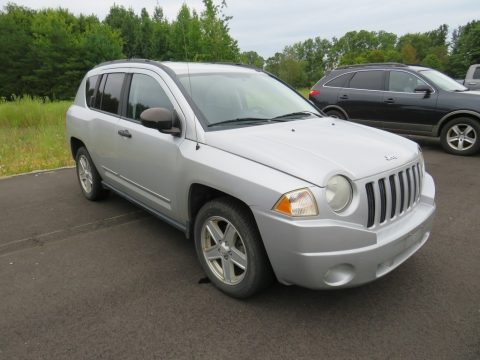 Bright Silver Metallic Jeep Compass Sport 4x4.  Click to enlarge.