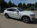 Front 3/4 View of 2020 BMW X4 xDrive30i #1