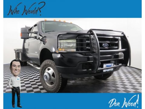Black Ford F350 Super Duty XLT Crew Cab 4x4 Dually.  Click to enlarge.