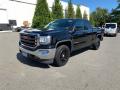 Front 3/4 View of 2016 GMC Sierra 1500 SLE Double Cab 4WD #2