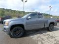 Front 3/4 View of 2020 GMC Canyon SLE Extended Cab 4WD #1