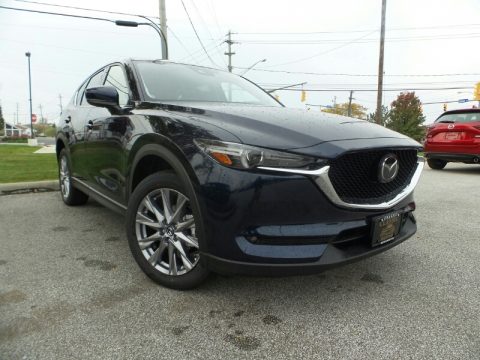 Deep Crystal Blue Mica Mazda CX-5 Grand Touring AWD. Click to enlarge. Deep Crystal Blue Mica Mazda CX-5 Grand Touring AWD. Click to enlarge.