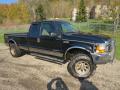 Front 3/4 View of 1999 Ford F250 Super Duty Lariat Extended Cab 4x4 #2