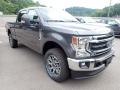 Front 3/4 View of 2020 Ford F250 Super Duty Lariat Crew Cab 4x4 #3