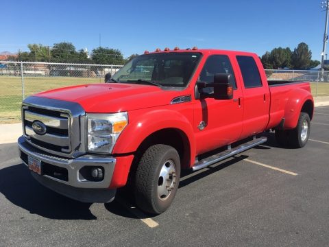 Vermillion Red Ford F450 Super Duty Lariat Crew Cab 4x4 Dually.  Click to enlarge.