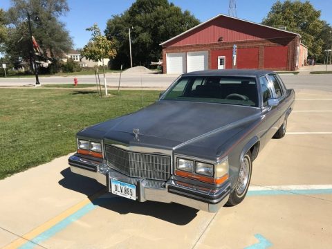 Medium Gray Metallic Cadillac Fleetwood Brougham.  Click to enlarge.