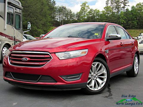 Ruby Red Metallic Ford Taurus Limited.  Click to enlarge.