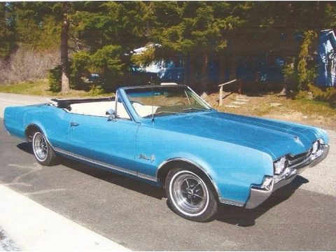 Blue/White Top Oldsmobile Cutlass Supreme Convertible.  Click to enlarge.