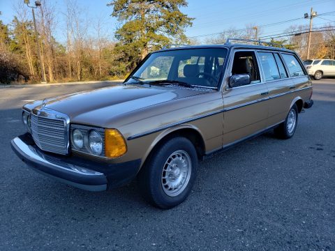 Sand Beige Metallic Mercedes-Benz E Class 300 TD Wagon.  Click to enlarge.