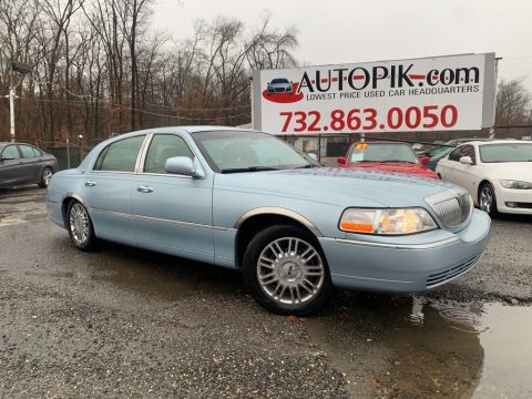 Light Ice Blue Metallic Lincoln Town Car Signature Limited.  Click to enlarge.