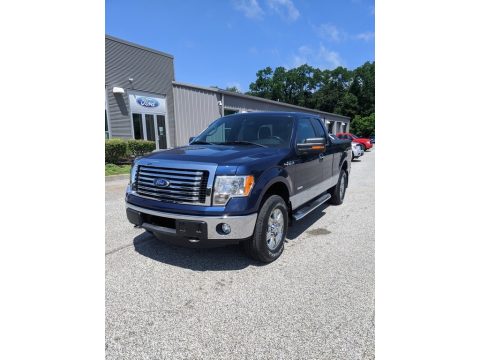 Dark Blue Pearl Metallic Ford F150 XLT SuperCab 4x4.  Click to enlarge.