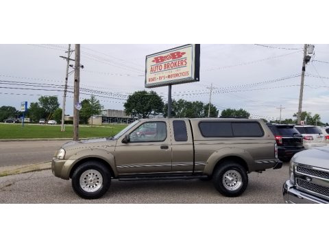 Gold Rush Metallic Nissan Frontier XE King Cab 4x4.  Click to enlarge.