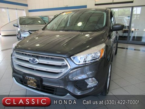 Magnetic Ford Escape SE 4WD. Click to enlarge. Magnetic Ford Escape SE 4WD. Click to enlarge.