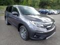 Front 3/4 View of 2021 Honda Pilot EX-L AWD #5