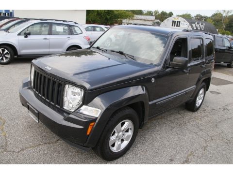 Light Sandstone Pearl Jeep Liberty Sport 4x4.  Click to enlarge.
