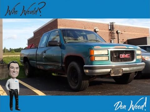 Bright Teal Metallic GMC Sierra 2500 SL Extended Cab.  Click to enlarge.