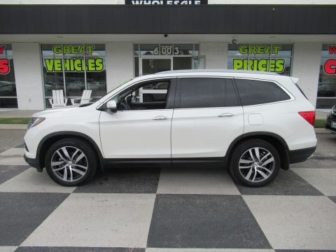 White Diamond Pearl Honda Pilot Touring AWD.  Click to enlarge.
