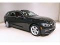 Front 3/4 View of 2017 BMW 3 Series 330i xDrive Sports Wagon #1