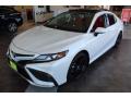 Front 3/4 View of 2021 Toyota Camry XSE #4