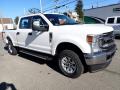 Front 3/4 View of 2021 Ford F250 Super Duty XLT Crew Cab 4x4 #8